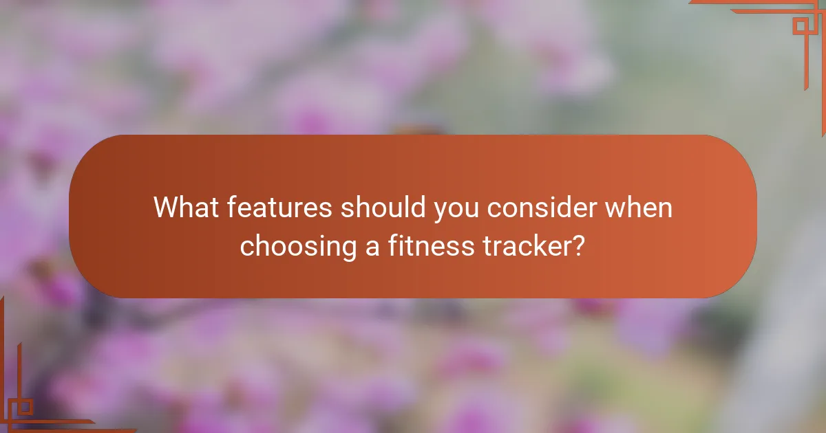 What features should you consider when choosing a fitness tracker?